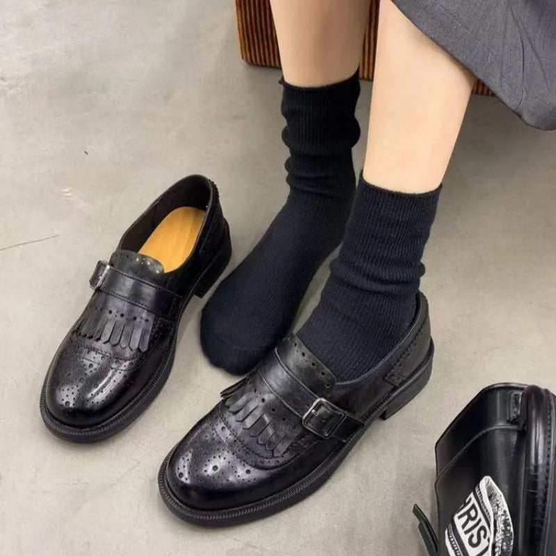 Black single strap with buckle Women's Brogue Loafers with Fringed Cap & Cushioned Footbed - Close Up Fringe Detail