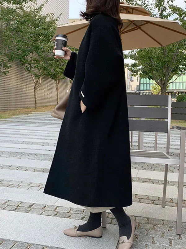 Women's Long Wool Coat with Relaxed Fit & Wide Sleeves - Back Walking Pose