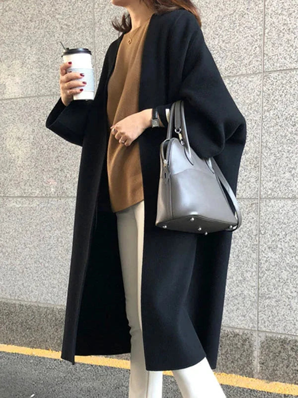 Women's Long Wool Coat with Relaxed Fit & Wide Sleeves - Casual Street Pose