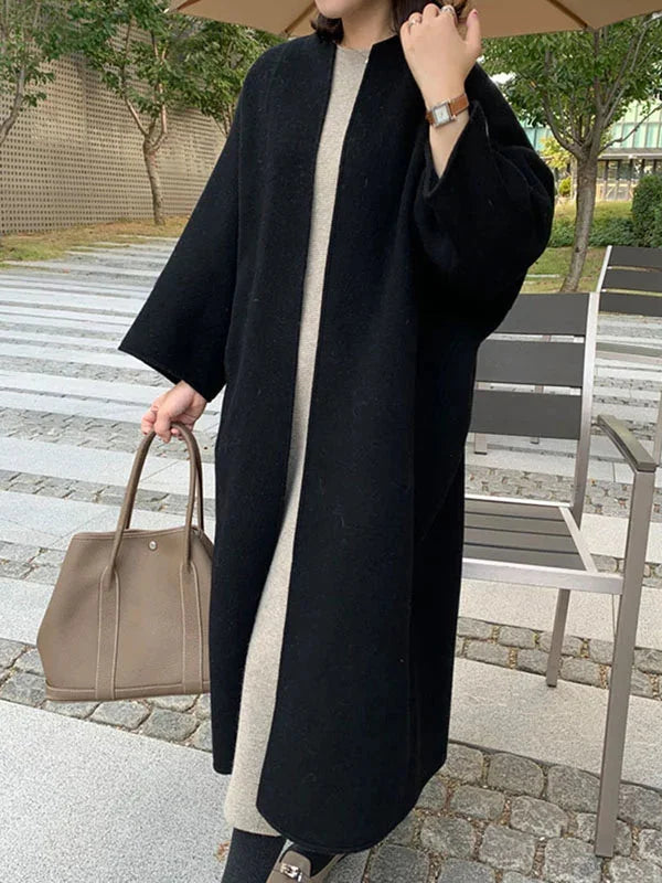 Women's Long Wool Coat with Relaxed Fit & Wide Sleeves - Outdoor Umbrella Pose