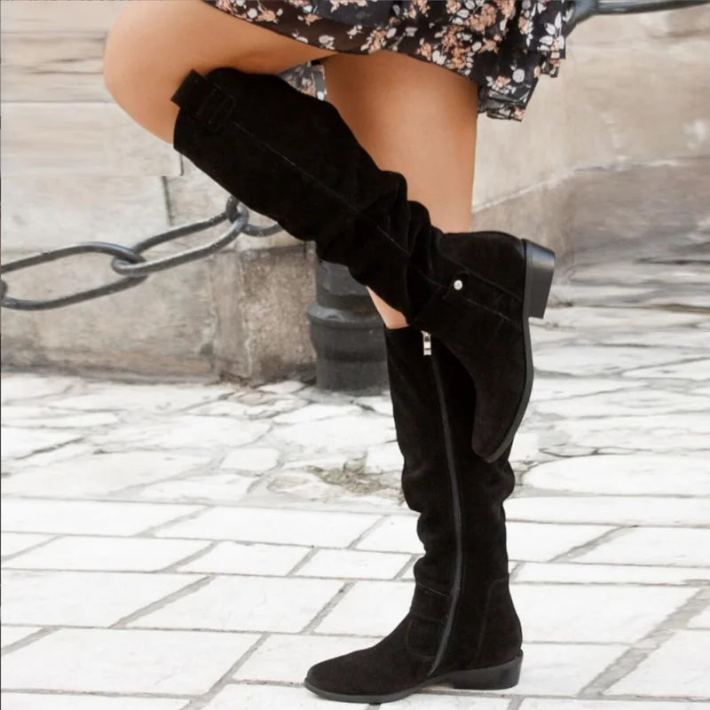 Black Women's Flat Knee High Boots with Relaxed Slouchy Fit & Side Zip - Kneeling Pose