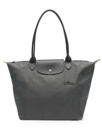 Women's Foldable Bag in Nylon with Leather Trim & Zip Closure - Front Hardware Detail