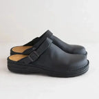 Black Men's Leather Mules with Buckle Strap & Slip-On Design — Reid - Side Profile Pair