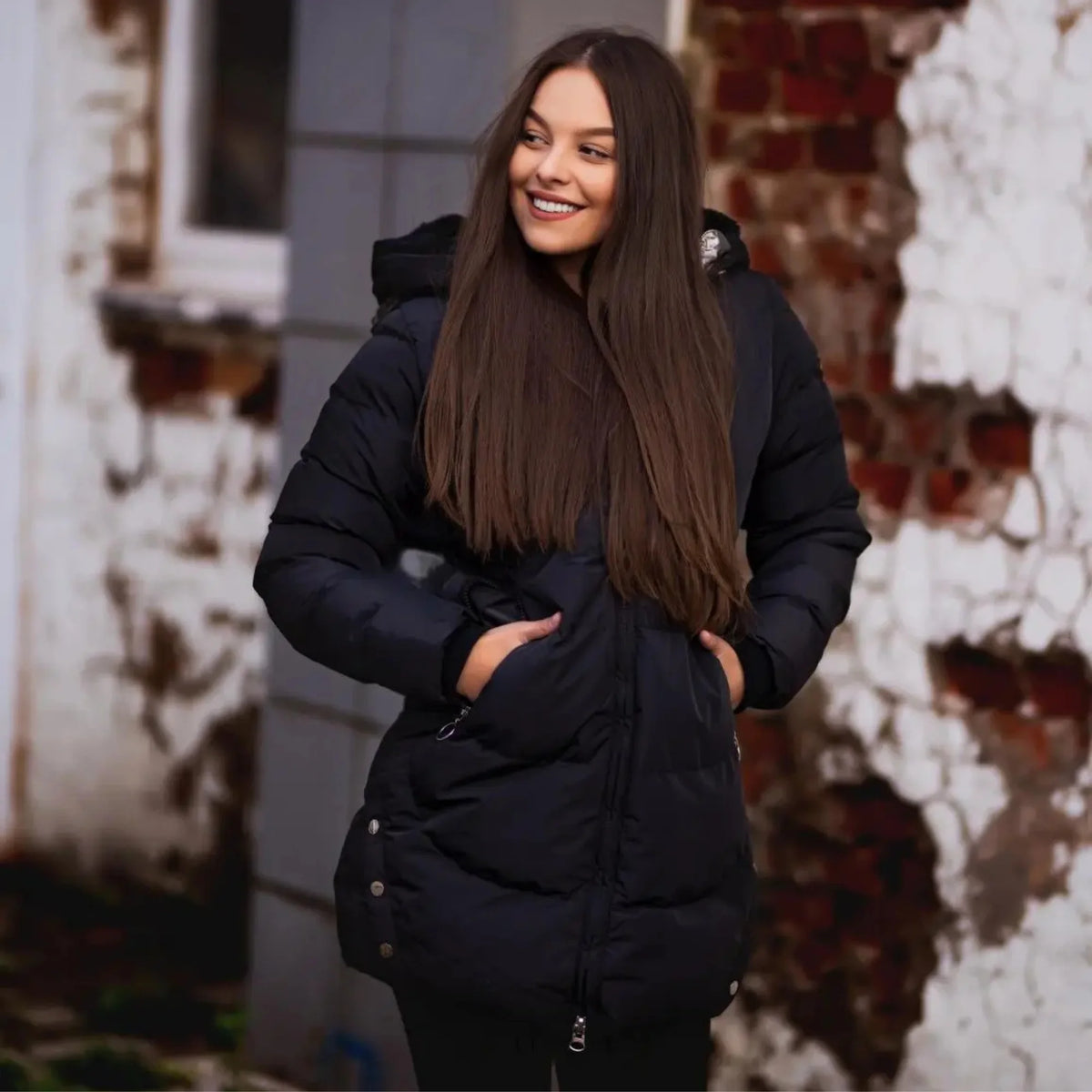Black Women's Long Puffer Coat with Hooded Lining & Diagonal Zip Front - Worn Lifestyle