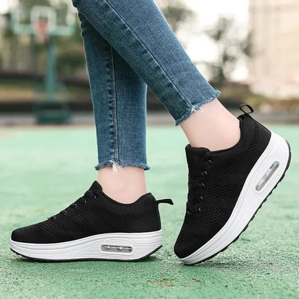 Black Women's Mesh Sneakers with Lace-Up Closure & Air Cushion Sole - Side Walking
