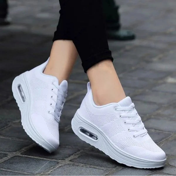 White Women's Mesh Sneakers with Lace-Up Closure & Air Cushion Sole - Worn Lifestyle
