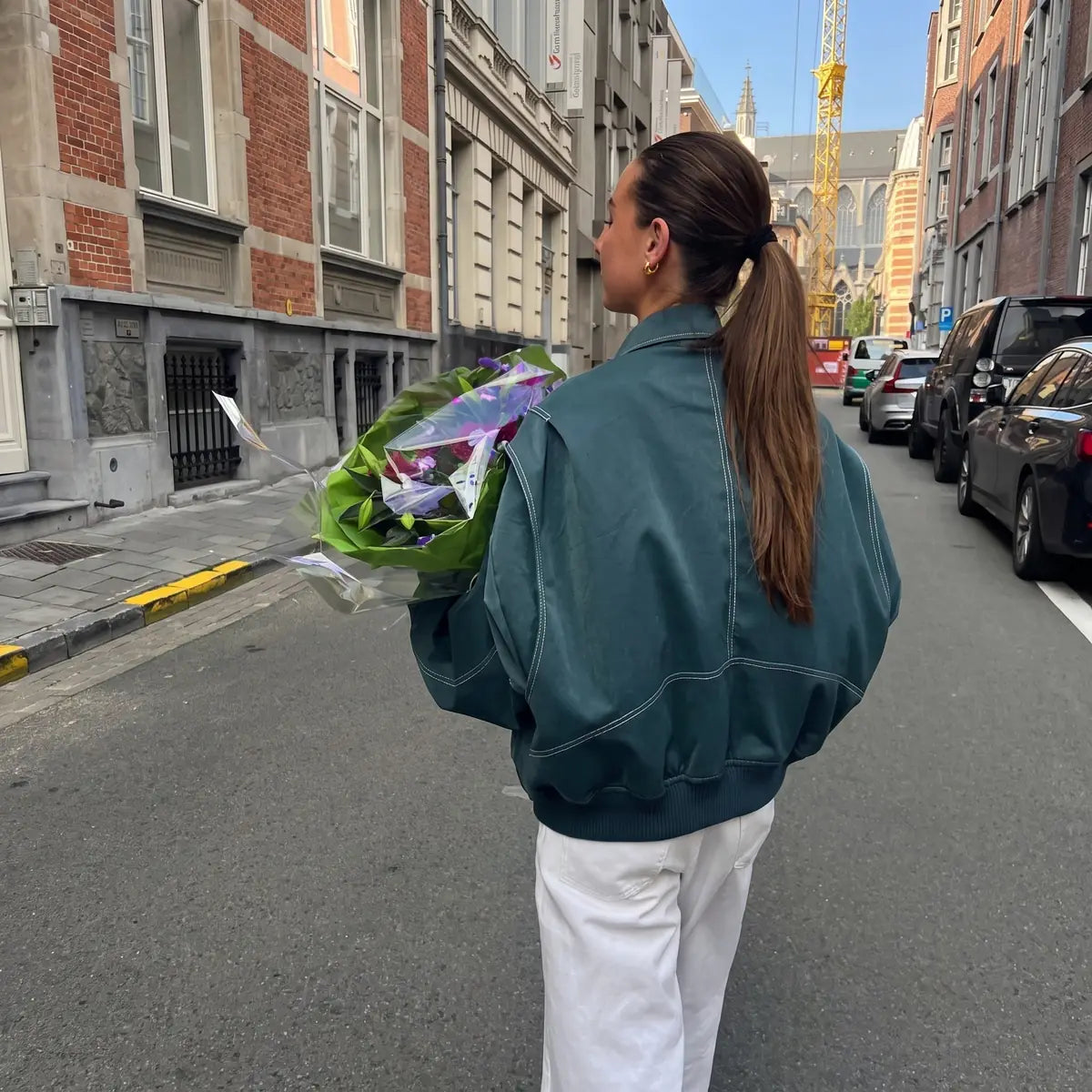 Women's Oversized Bomber Jacket with Contrast Stitch & Ribbed Cuffs - Back Walking Street
