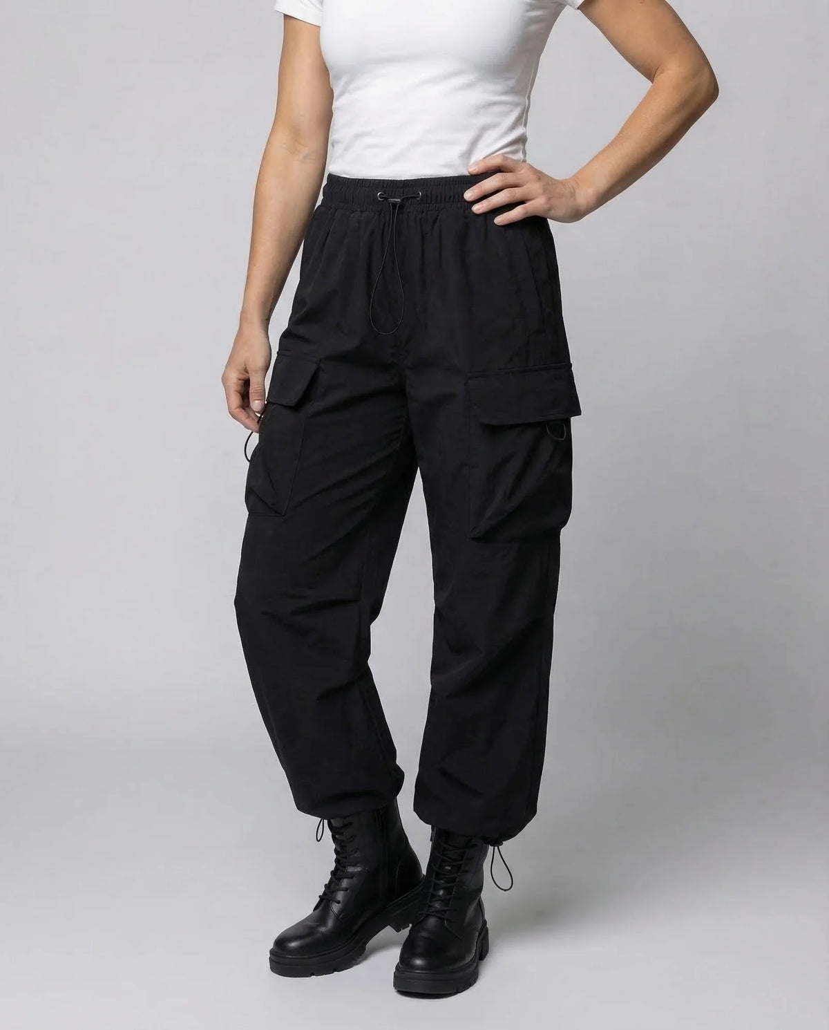 Black Women's Oversized Cargo Pants with Drawstring Waist & Flap Pockets — Layla - Front Torso Crop