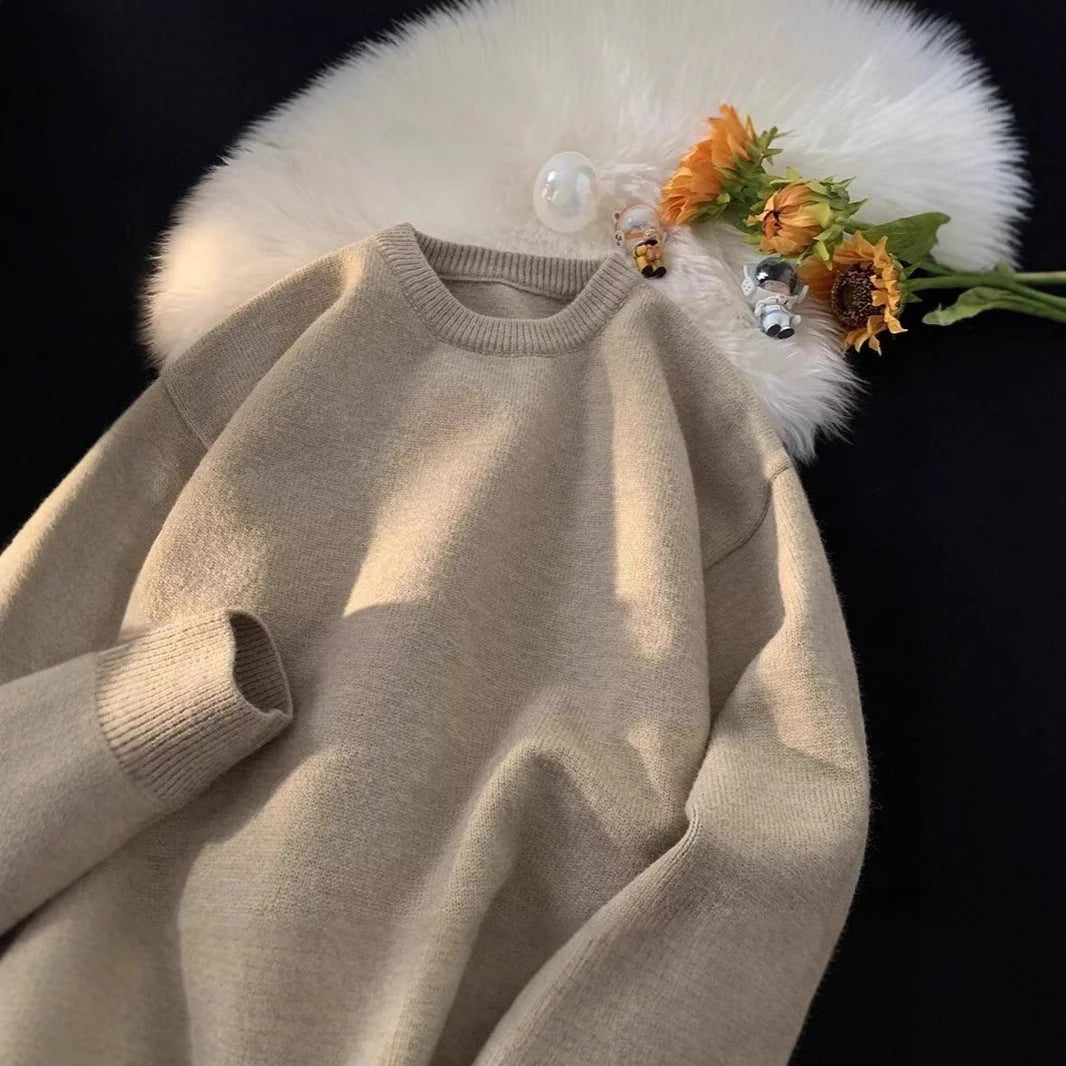 Women's Oversized Sweater with Round Neckline & Stretchy Cuffs - Flat Lay With Flowers