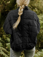 Women's Oversized Quilted Jacket with Stand Collar & Zip Pockets - Back Braid Pose