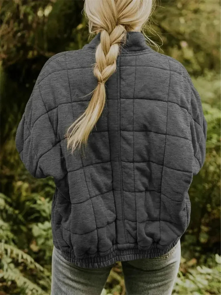 Women's Oversized Quilted Jacket with Stand Collar & Zip Pockets - Back Braid Pose