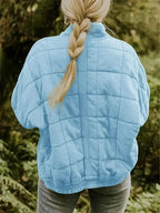 Women's Oversized Quilted Jacket with Stand Collar & Zip Pockets - Back Braid Pose