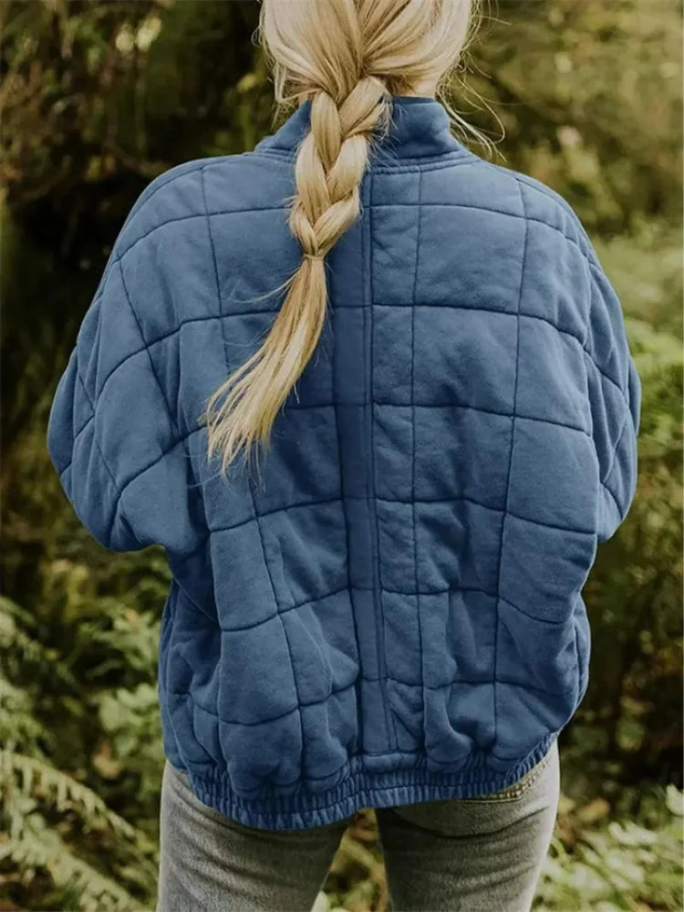 Women's Oversized Quilted Jacket with Stand Collar & Zip Pockets - Back Braid Pose