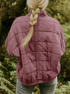 Women's Oversized Quilted Jacket with Stand Collar & Zip Pockets - Back Braid Pose