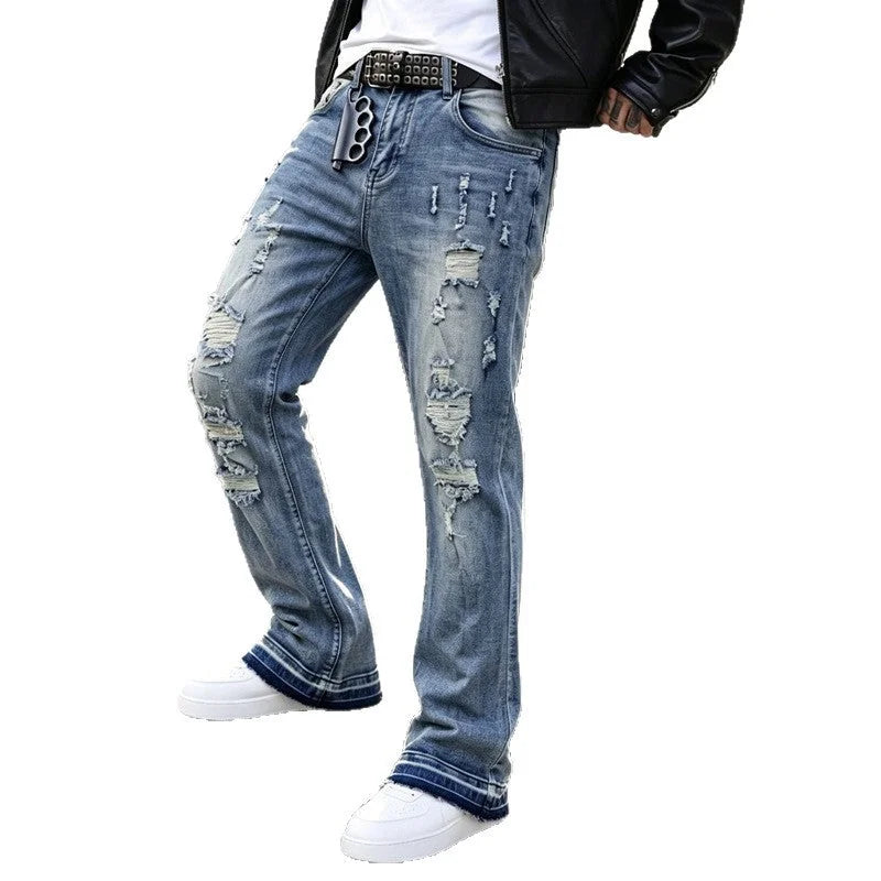 Blue Men's Ripped Jeans with Slim-Fit Flare & Raw Hem Detail - Studio Cutout