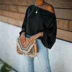 Black Women's Satin Blouse with Asymmetric Off-Shoulder Neckline & Batwing Sleeves - Front Full With Clutch