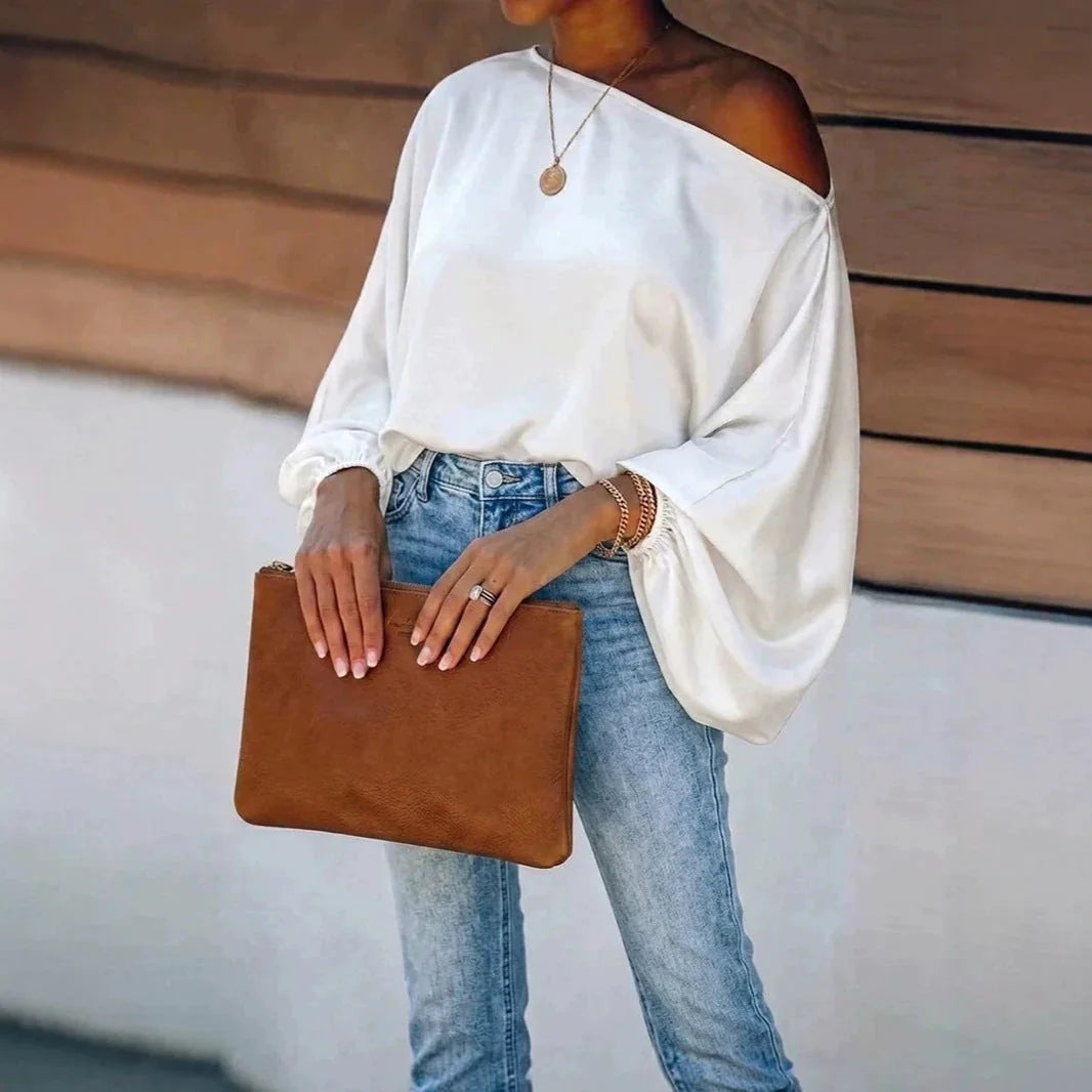 White Women's Satin Blouse with Asymmetric Off-Shoulder Neckline & Batwing Sleeves - Front Pose Jeans