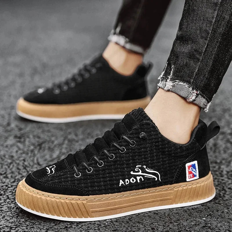 Black Women's Low Top Sneakers with Textured Lace-Up Design & Pull Tab - Close Up Side