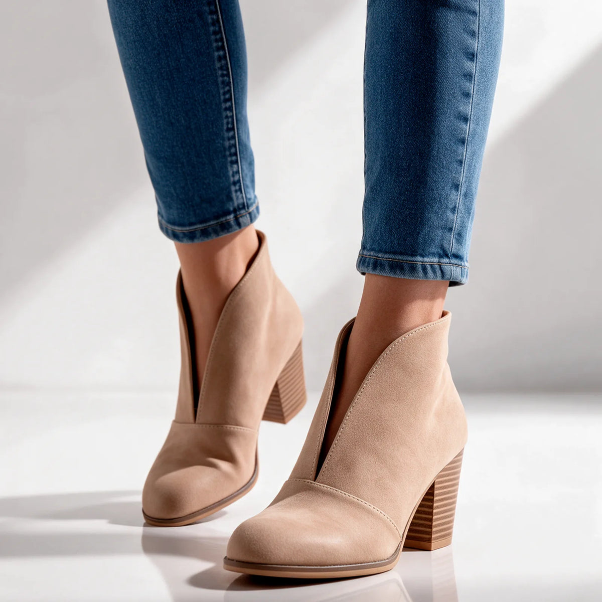 Women's V-Cut Ankle Boots with Almond Toe & Stacked Block Heel - Worn Closeup Jeans